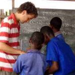 Volunteer math teacher in village school, Ghana Africa. Volunteer with sightseeing in Ghana